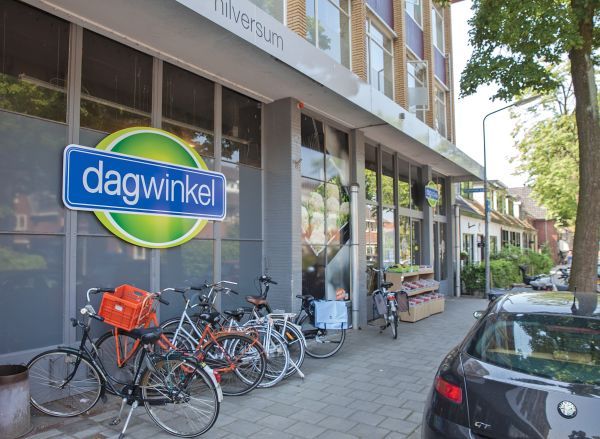 Dagwinkel kijkt naar grotere oppervlaktes