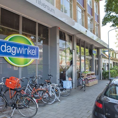 Dagwinkel kijkt naar grotere oppervlaktes